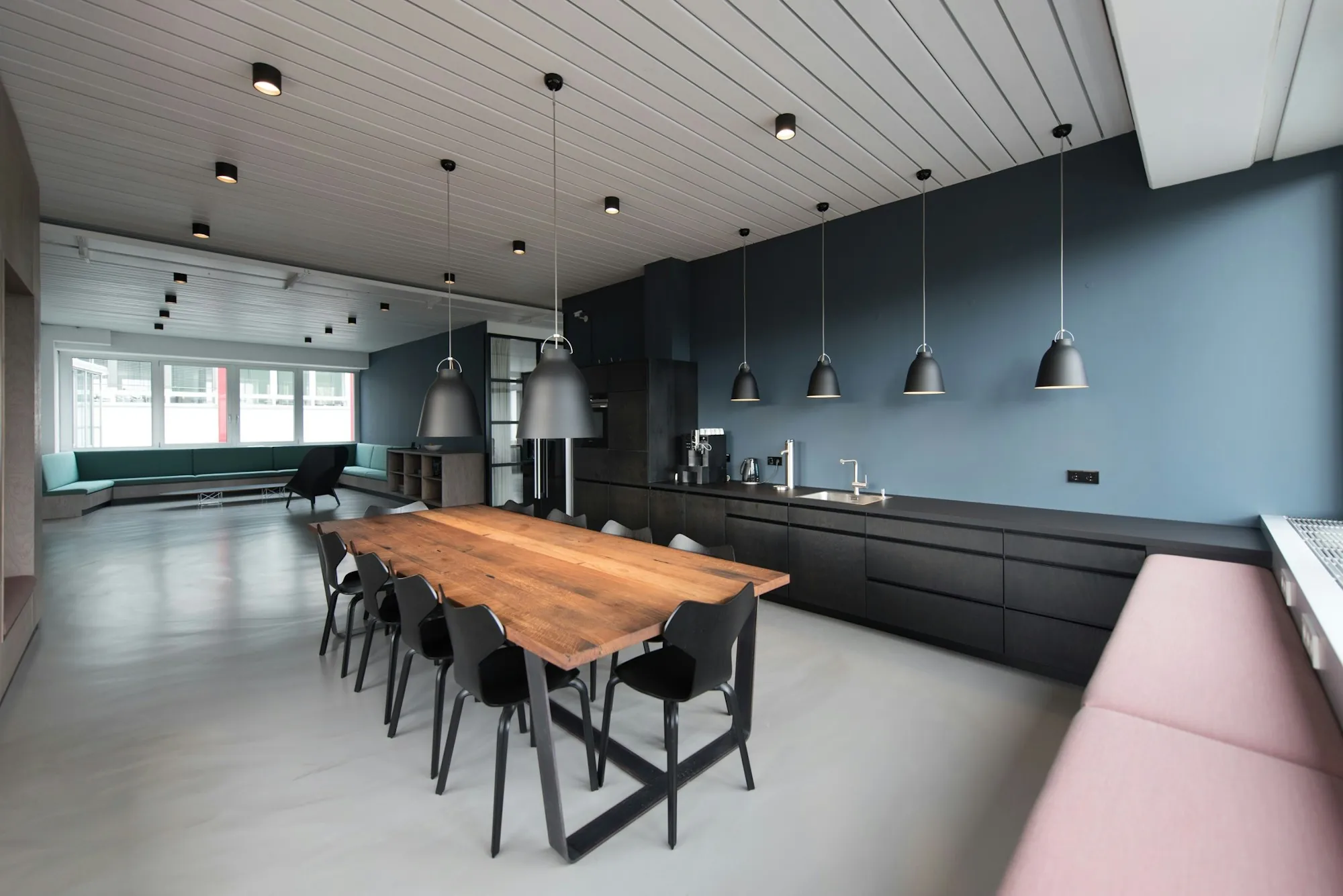 Large breakroom with a long wood table