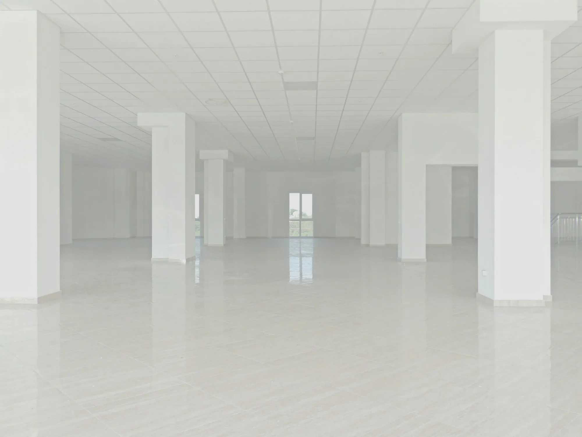 Vacant office space with clean white tile